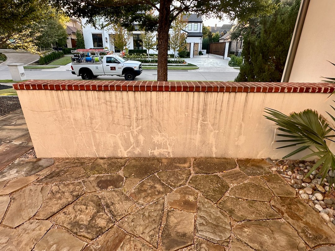 Professional Softwashing of a Stucco Home and Sandstone Walkway & Patio 