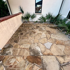 Professional-Softwashing-of-a-Stucco-Home-and-Sandstone-Walkway-Patio 21