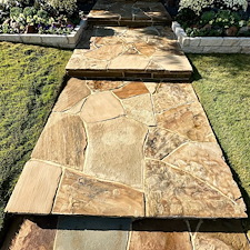 Professional-Softwashing-of-a-Stucco-Home-and-Sandstone-Walkway-Patio 10