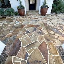 Professional-Softwashing-of-a-Stucco-Home-and-Sandstone-Walkway-Patio 9