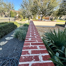 Professional-Softwashing-of-a-Stucco-Home-and-Sandstone-Walkway-Patio 6