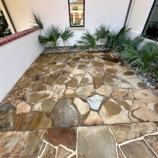 Professional-Softwashing-of-a-Stucco-Home-and-Sandstone-Walkway-Patio 4