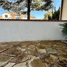 Professional-Softwashing-of-a-Stucco-Home-and-Sandstone-Walkway-Patio 3